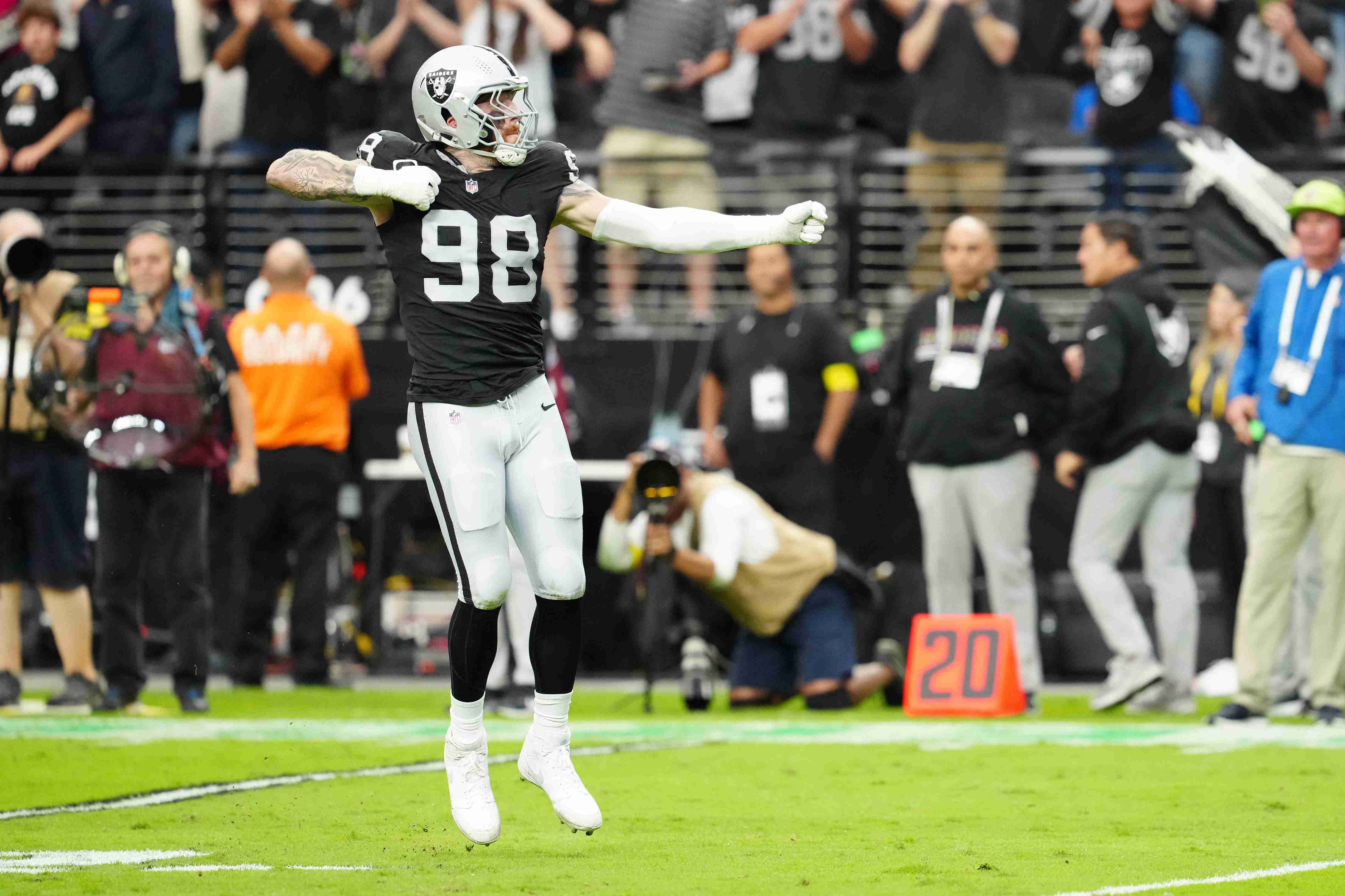 Oct 12, 2025; Paradise, Nevada, USA; Las Vegas Raiders defensive end Maxx Crosby (98) reacts after a play during the second half against the Tennessee Titans at Allegiant Stadium. Mandatory Credit: Stephen R. Sylvanie-Imagn Images