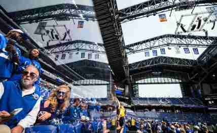 Trey and Heather Morrone, in-laws of Indianapolis Colts guard Dalton Tucker (68), sit in the stands Sunday, Sept. 8, 2024, ahead of the game against the Houston Texans at Lucas Oil Stadium in Indianapolis.